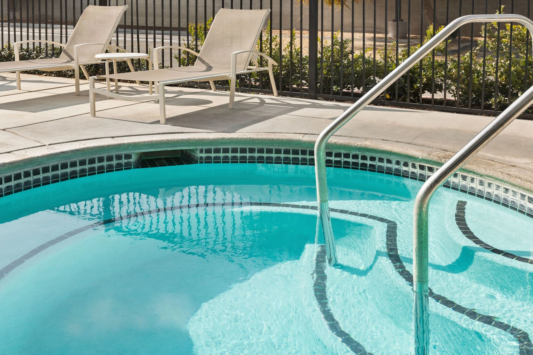 Seasonal outdoor swimming pool and seating area